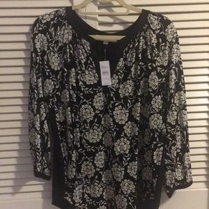 Cream and black blouse